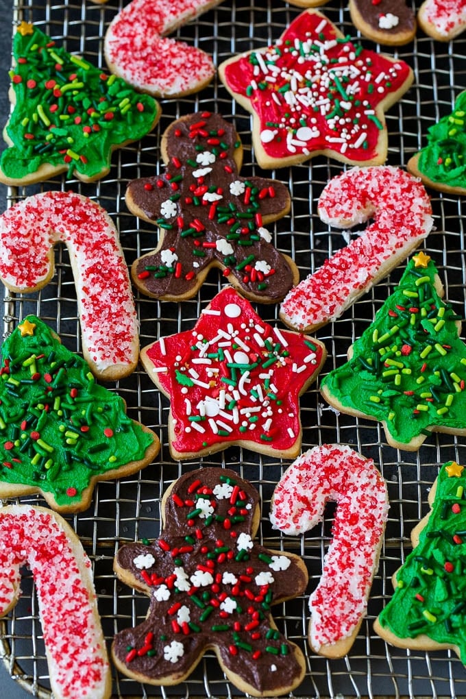 Decorated Christmas cookies on a cooling rack.