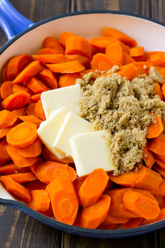 Sliced cooked carrots with butter and brown sugar.