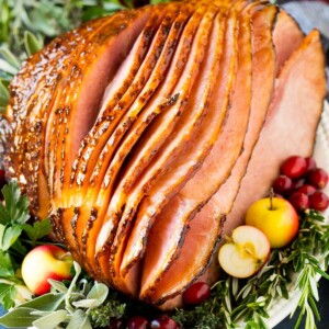 How to cook a ham results of a glazed ham garnished with fruit.