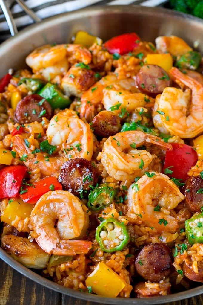 A pan of jambalaya made with shrimp, sausage, chicken, rice and vegetables.