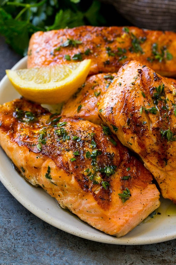 Grilled marinated salmon fillets with lemon, garlic and herbs.