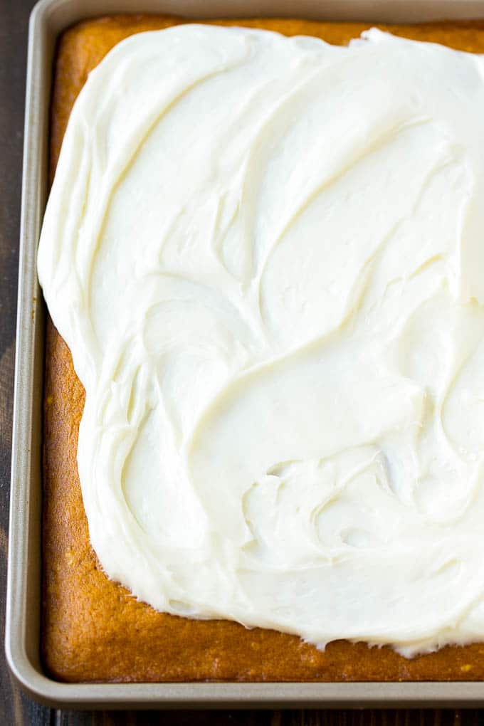 Cream cheese frosting spread over cake.