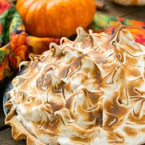 The most delicious pumpkin pie topped with a mountain of toasted brown sugar meringue.