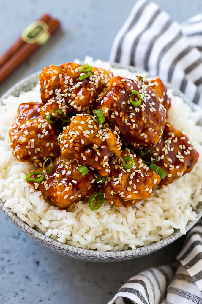 Crispy sesame chicken served over steamed rice.