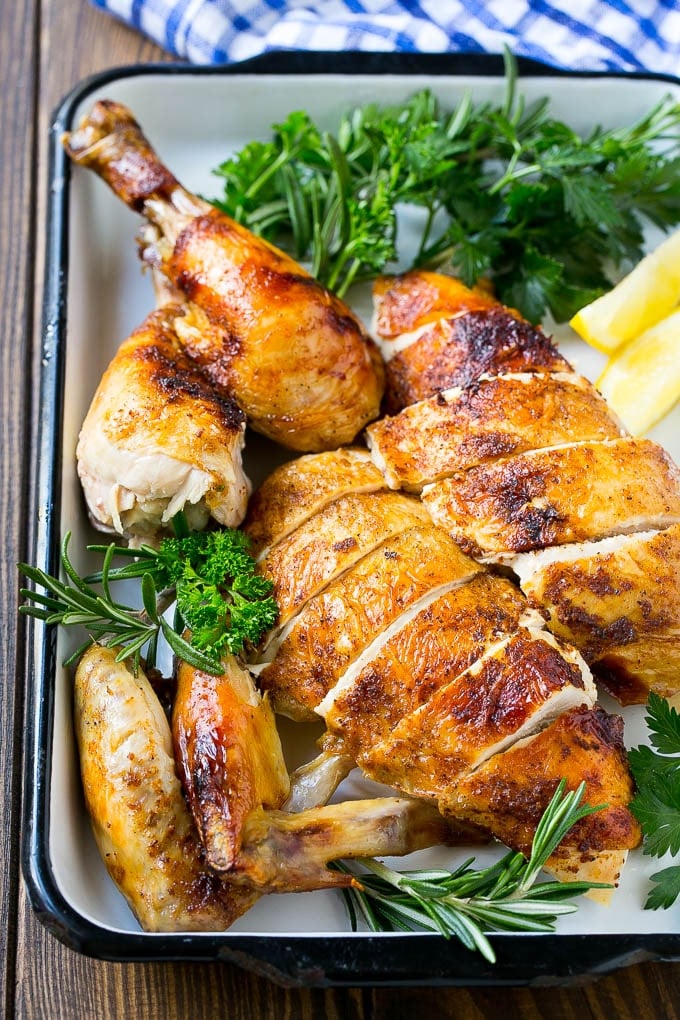 A platter of carved slow cooker whole chicken.