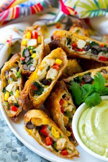 These southwestern egg rolls are loaded with a colorful variety of vegetables, chicken, beans and plenty of melty cheese, all wrapped up in a crispy roll. The ultimate party appetizer!